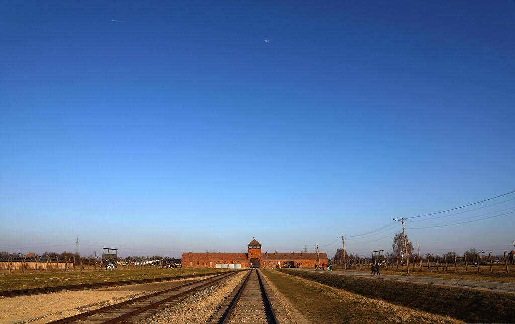 The moon rises over the main railway building on the site of the former Nazi German concentration and extermination camp Auschwitz II-Birkenau, in Brzezinka near Oswiecim, Poland, March 13, 2022 (Photo: Reuters) The moon rises over the main railway building on the site of the former Nazi German concentration and extermination camp Auschwitz II-Birkenau, in Brzezinka near Oswiecim, Poland, March 13, 2022