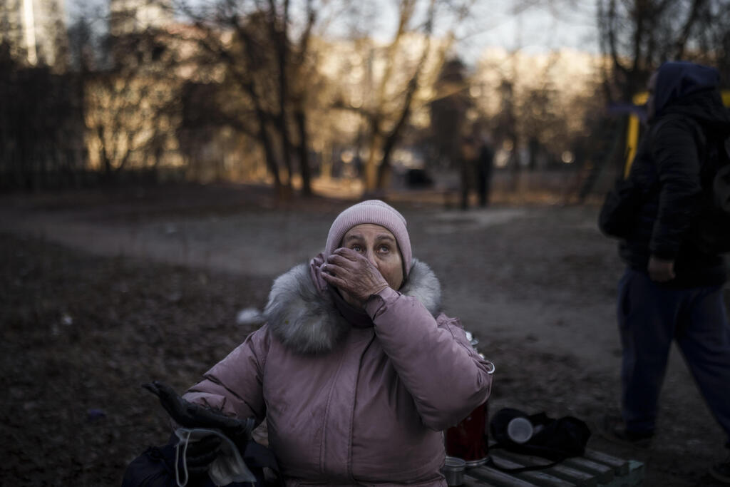 Woman in distress over Russian shelling in Kyiv 