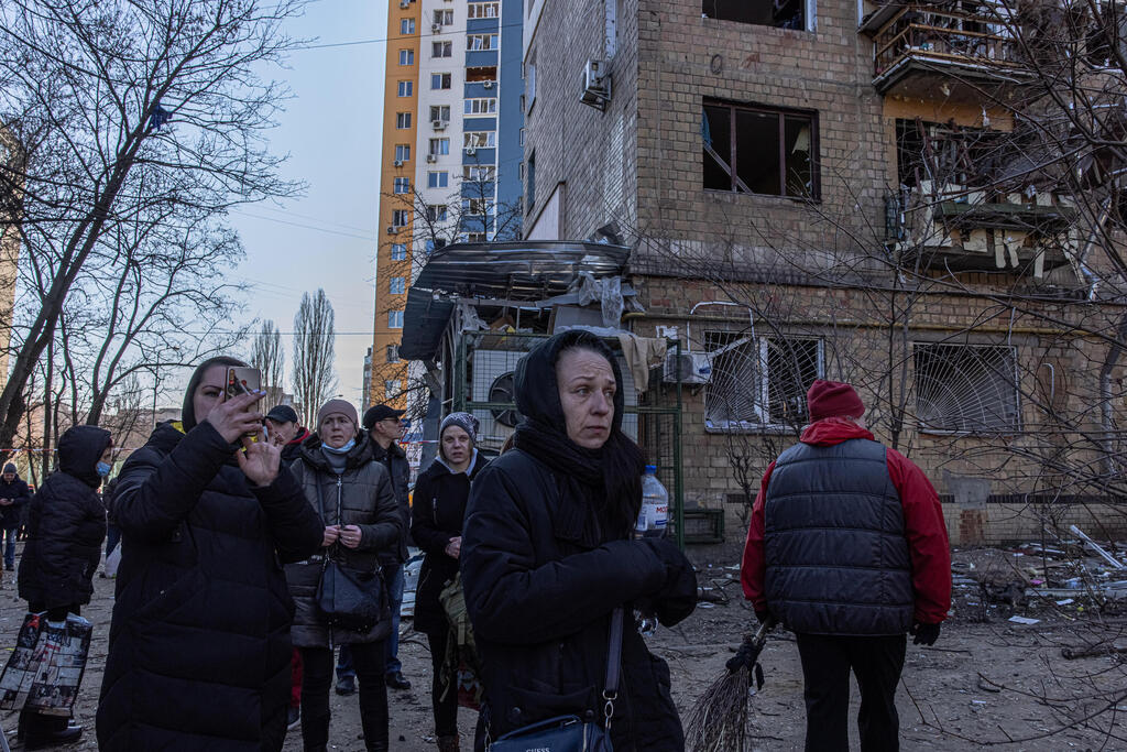 Residents of Kyiv walk among destruction after Russian bombing of the city 