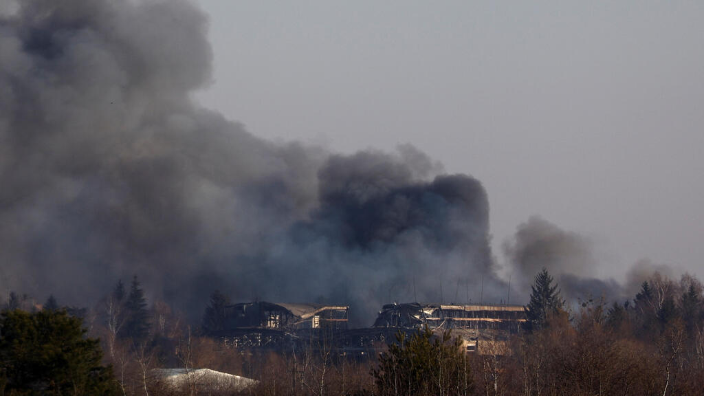 A factory near the Lviv airport on fire after Russian bombing on Friday 