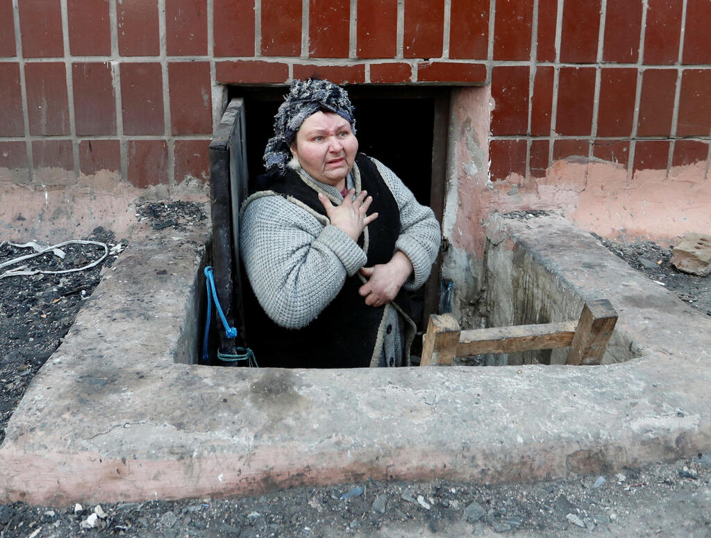 Woman climbed out of underground cellar where she shelters from Russian attacks 