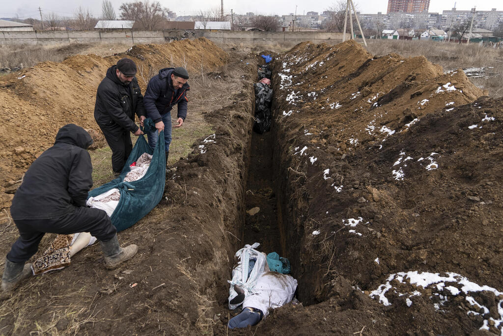 Mass graves dug in Mariupol earlier this month 