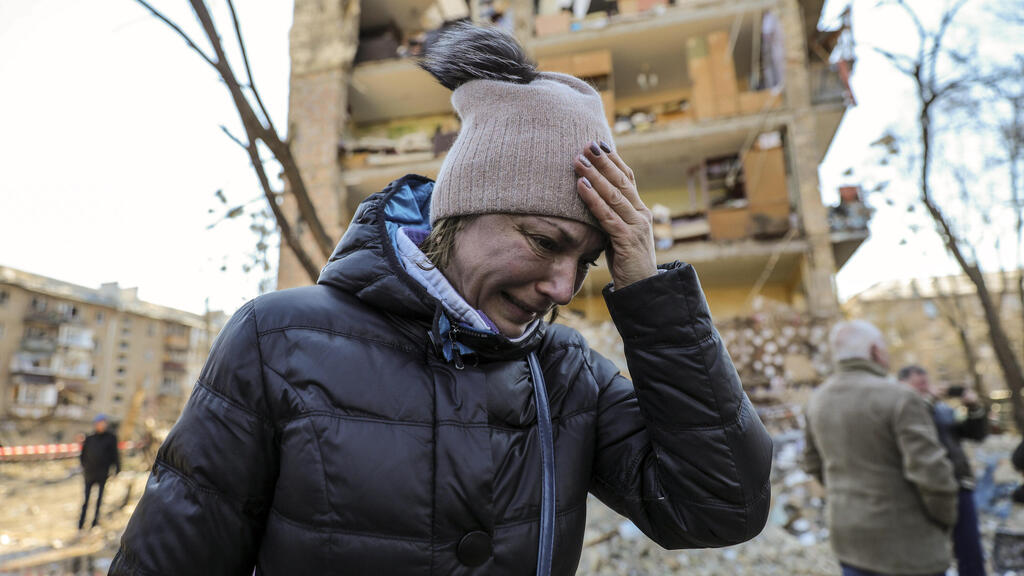 A resident of Kyiv distressed following Russian bombing of her city 