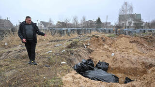 קבר אחים ב בוצ'ה אוקראינה מלחמה עם רוסיה