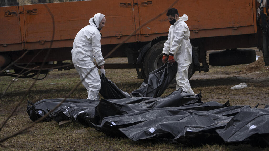 Bodies of Ukrainians taken from a mass grave near Kyiv for identification on Sunday (Photo: AP) Bodies of Ukrainians taken from a mass grave near Kyiv for identification on Sunday