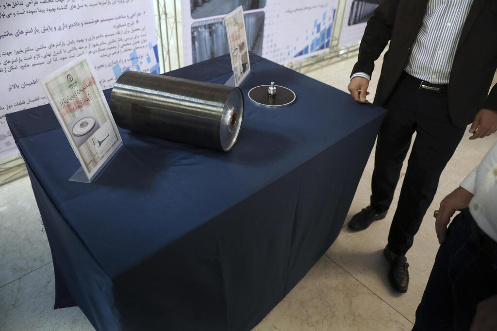 domestically-produced parts for centrifuge machines are on display in an exhibition of Iran's nuclear achievements earlier this month 