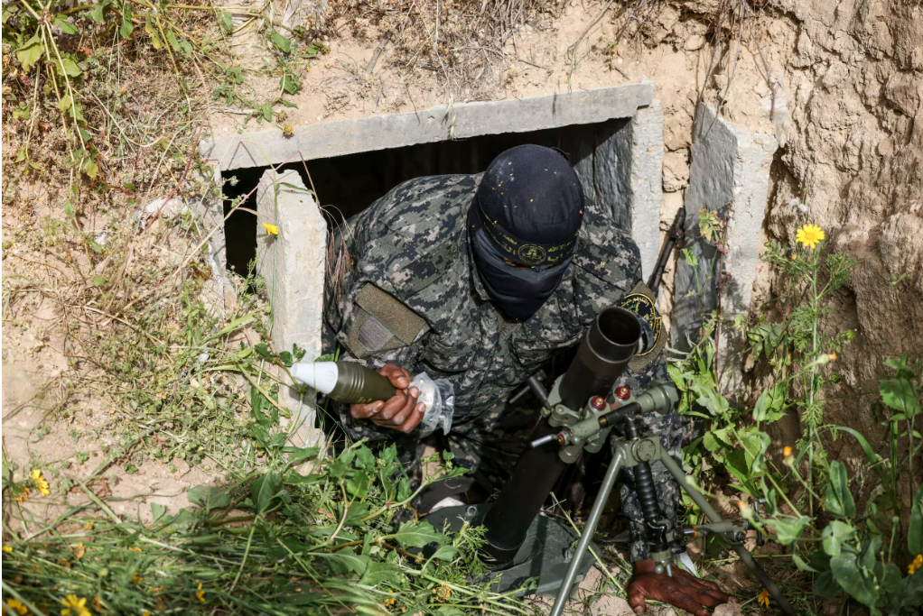A member of the Palestinian Islamic Jihad militant group sets up a mortar in a tunnel in the Gaza Strip