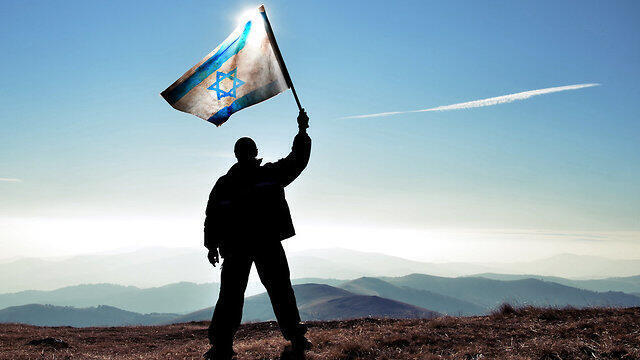 Man holds Israeli flag 