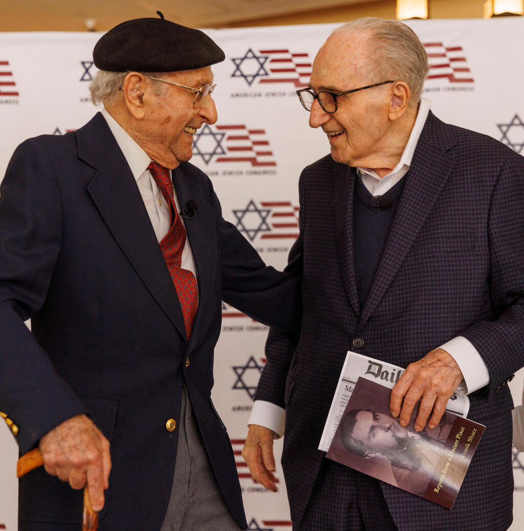 Holocaust survivors Dr. George Berci (R), 101, and Frank Shatz, 96, who have not seen each other since their escapes during World War II from a Nazi labor camp, reunite after Shatz traveled from Virginia to meet Berci at a Village Senior Living center in Los Angeles, CA, May 18, 2022 