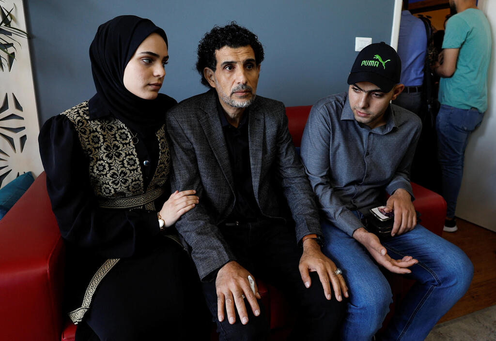 Al-Qolaq with family, in Gaza City, May 24, 2022