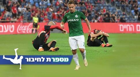 מקסים פלקושצ'נקו עם שחקני הפועל חיפה מאוכזבים