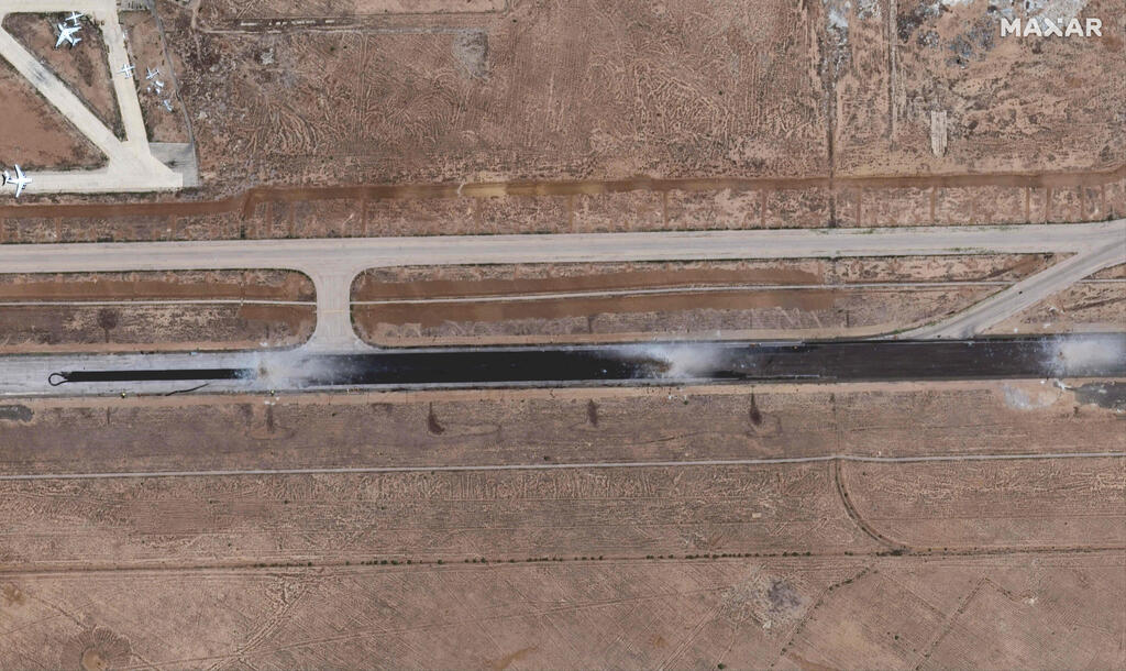 satellite image released by Maxar Technologies, shows damage to a runway at Damascus International Airport