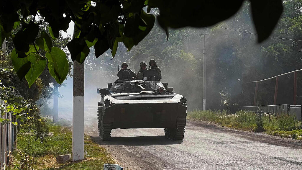 אוקראינה חיילים רוסים בדרך ל ליסיצ'נסק דונבאס מלחמה עם רוסיה