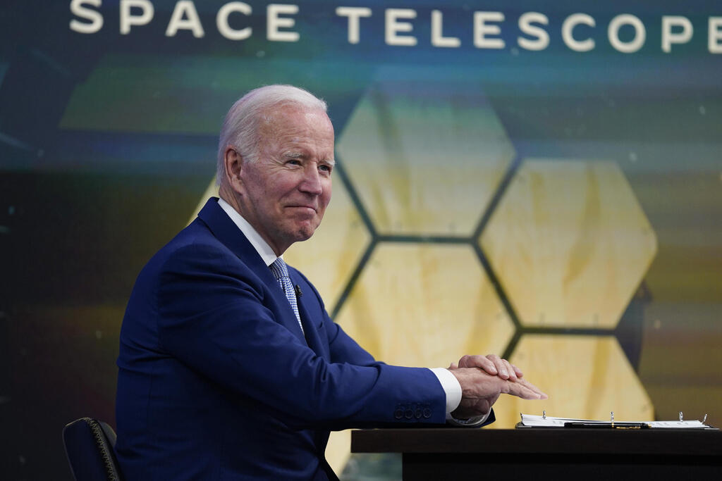 President Joe Biden listens during a briefing from NASA officials about the first images from the Webb Space Telescope