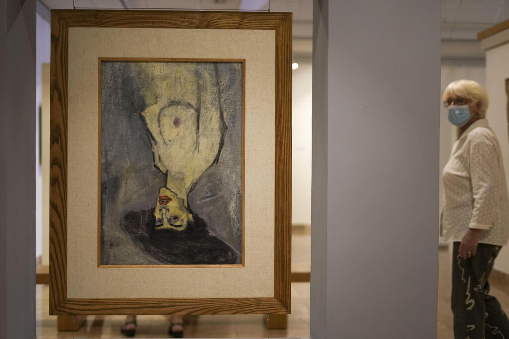 Amadeo Modigliani's 1908 'Nude with a Hat,' is hung upside down because another painting by him, 'Maud Abrantes,' on the reverse side of the same canvas is oriented correctly, while on display at Haifa University's Hecht Museum in Haifa, Israel, June 28, 2022