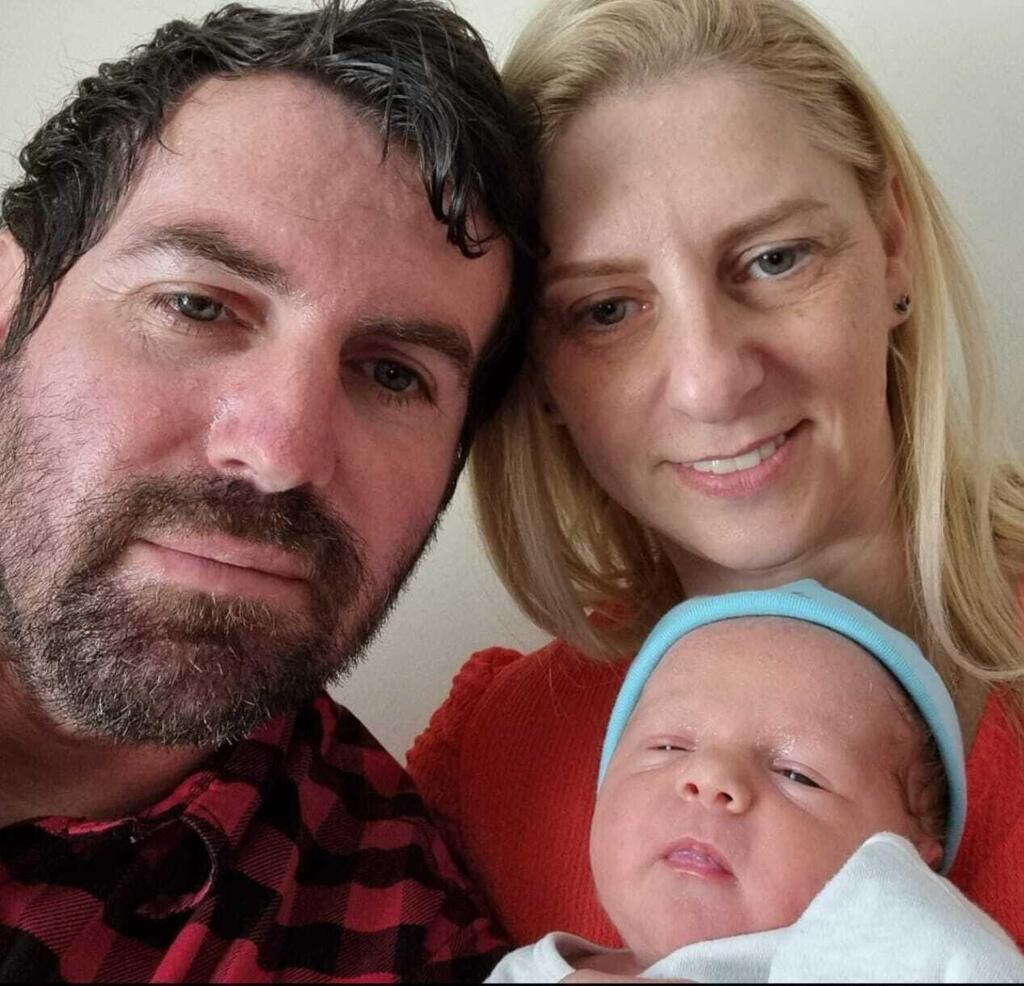 Sarit and Alex Haiman with their baby son 