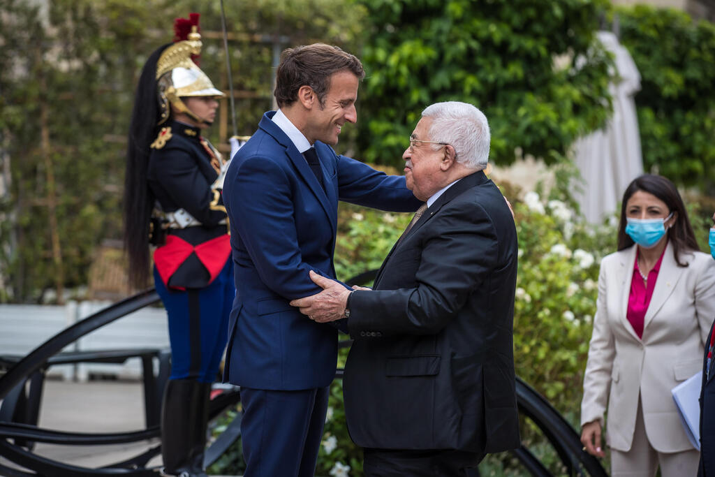 Emmanuel Macron and Mahmoud Abbas in Paris on Wednesday 