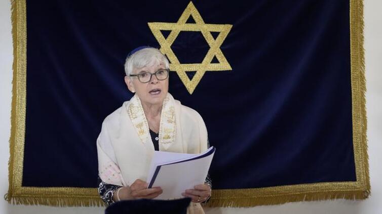 Rabbi Barbara Aiello reads prayers in her "Ner Tamid del Sud" (The Eternal Light of the South) synagogue in Serrastretta 