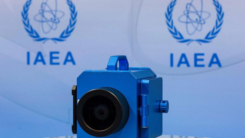A surveillance camera is displayed during a news conference about developments related to the IAEA's monitoring and verification work in Iran 