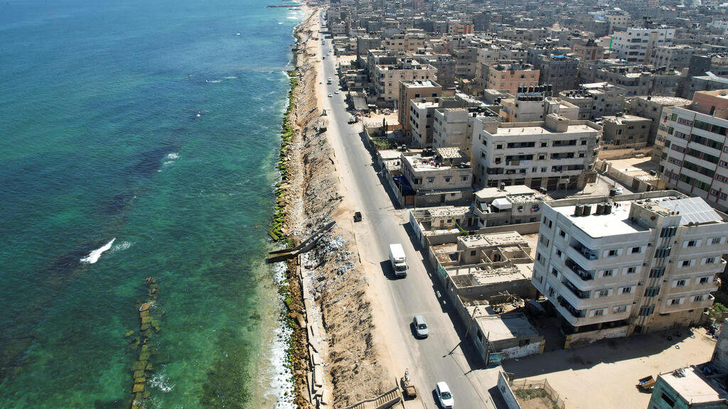 A general view of Beach refugee camp showing the erosion of the shore and new vertical wave breakers placed inside the sea in Gaza City