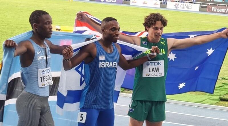 Afrifah (c) and runnerup Letsile Tebogo (L) 