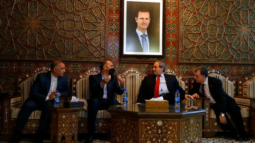 Syrian Foreign Minister Faisal Mekdad holds talks with his Iranian counterpart Hossein Amir-Abdollahian in Damascus, Syria, March 23, 2022 