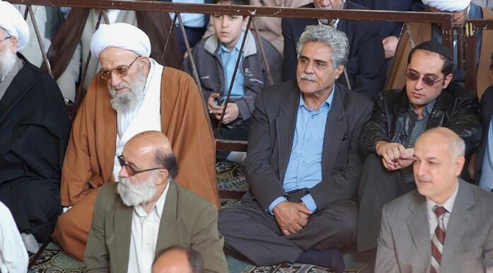 Haroun Yashayaei, the former head of Iran’s Jewish community, shown in center, attends a Muslim Friday prayer to show solidarity with the Palestinians 