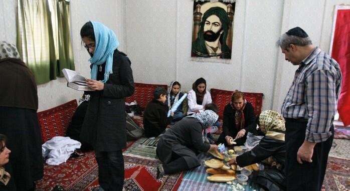 On their way to visit the tomb of Esther and Mordechai in Hamedan, Jews stop to pray in a Muslim prayer room 