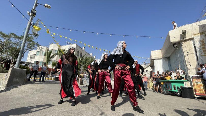 Traditional dabke line dancing at the Oktoberfest in Taybe in the West Bank 