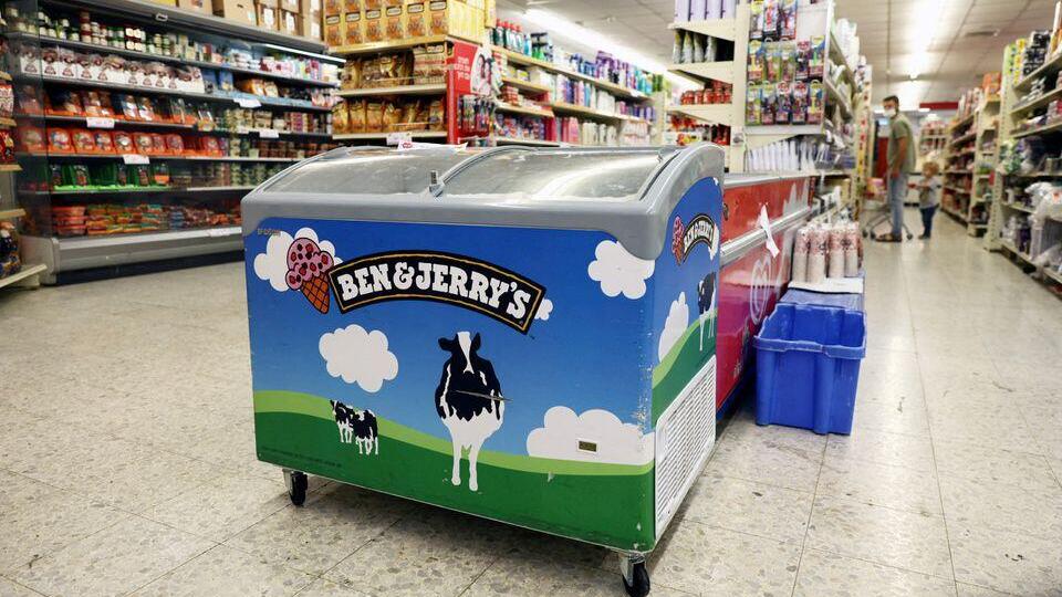 A refrigerator bearing the Ben & Jerry's logo is seen at a food store in the Jewish settlement of Efrat in the Israeli-occupied West Bank July 20, 2021 