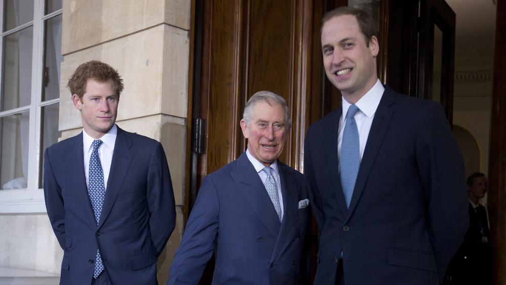 ritain's Prince Charles, center, with his sons Prince William, right, and Prince Harry 