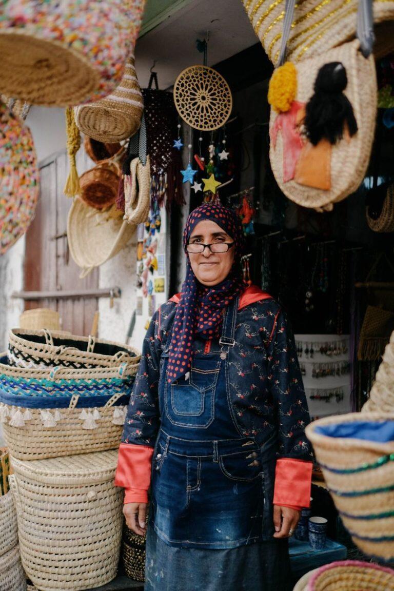 A Moroccan Muslim woman diplays her wares in the mellah 