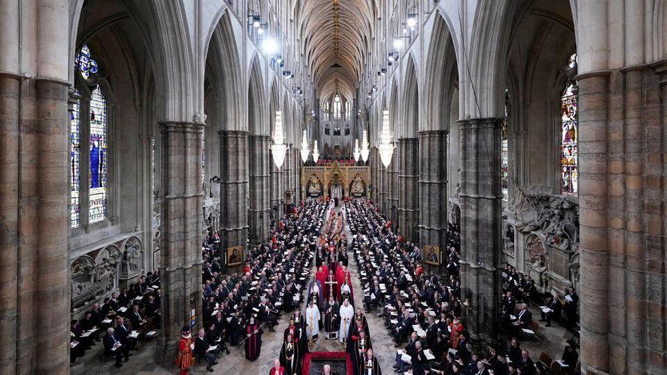 Members of the clergy wait for the coffin of Queen Elizabeth II to arrive at Westminster Abbey 
