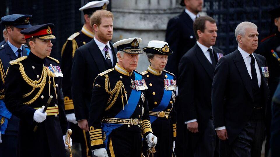 Britain's King Charles, Britain's Anne, Princess Royal, Prince Andrew, Prince Harry and Peter Phillips attend the state funeral and burial of Britain's Queen Elizabeth 