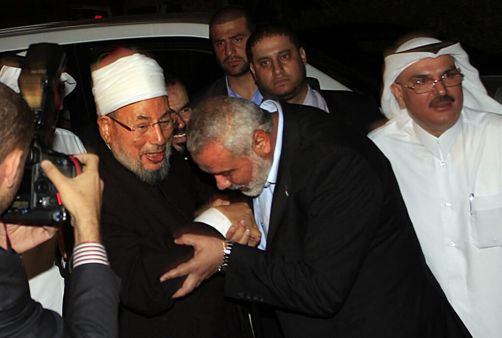 Youssef al-Qaradawi with Ismail Hanyeh 