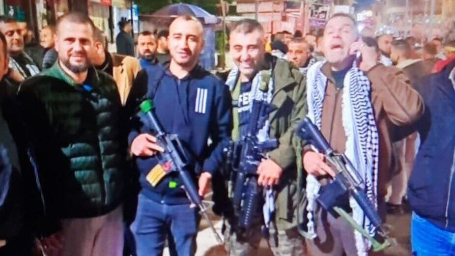 Doctor killed from wounds sustained in Jenin stands armed in center with other militants 