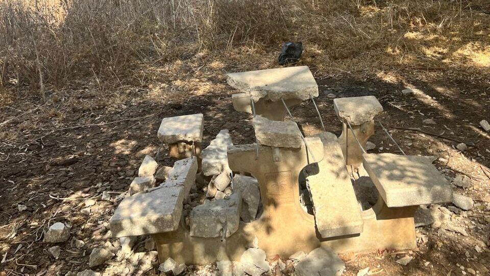 One of the shattered park benches (Photo: Hannah Levy Attali) One of the shattered park benches