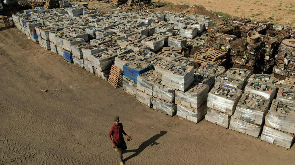 broken batteries collected for sale and export, in Gaza 