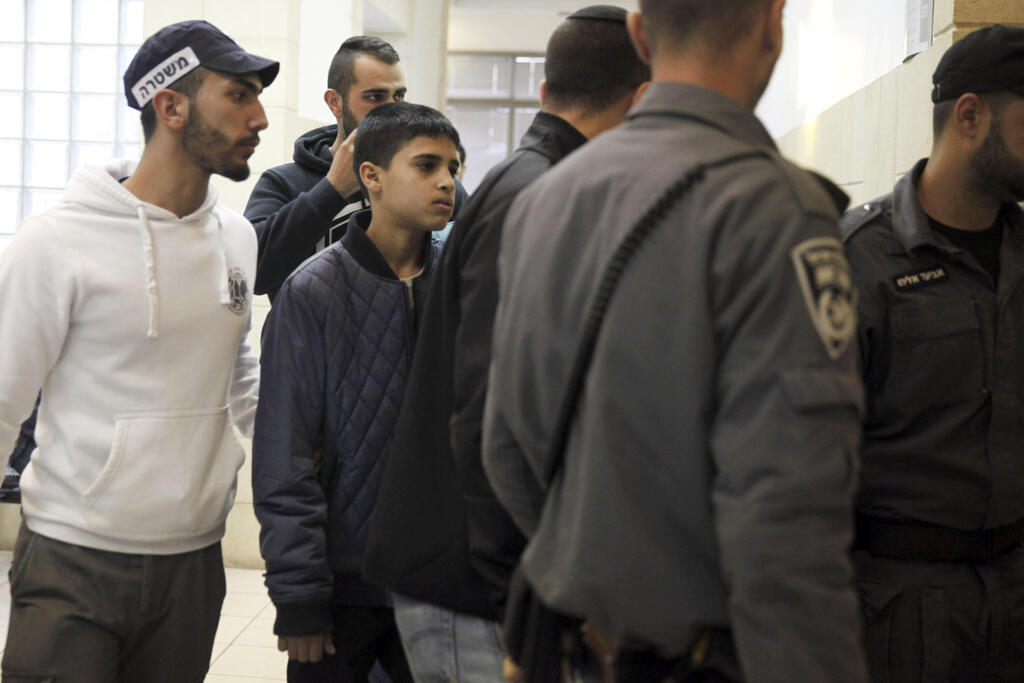 Ahmed Manasra, 13, brought to a court in Jerusalem, on Nov. 10, 2015 