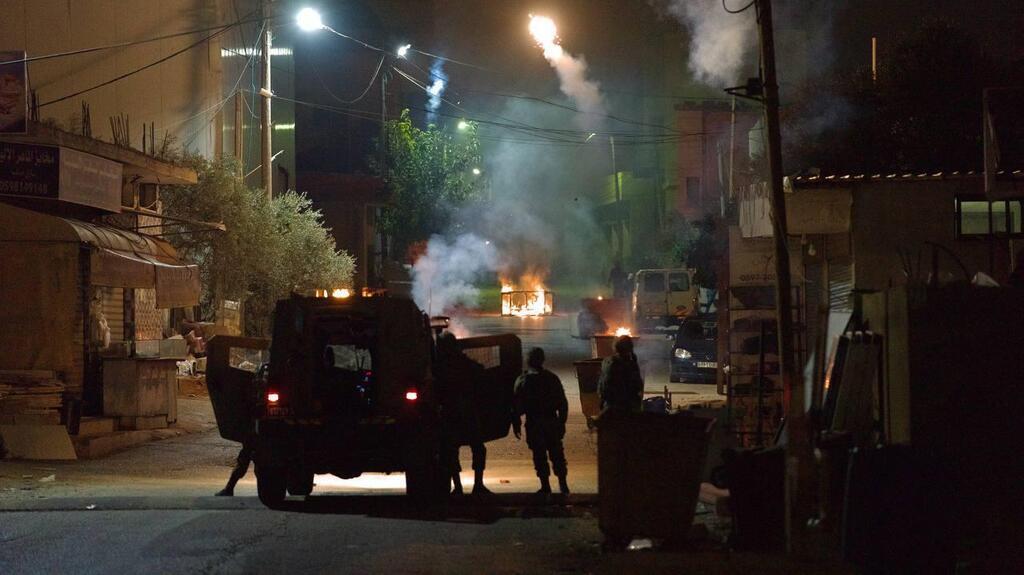 Clashes in the West Bank village of Hares, home of the terrorist who killed three in Ariel on Tuesday 