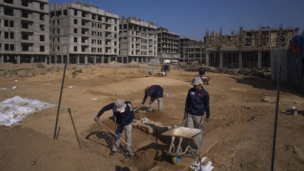 A Palestinian excavation team works in a newly discovered Roman era cemetery in the Gaza Strip, Sunday, Dec. 11, 2022 