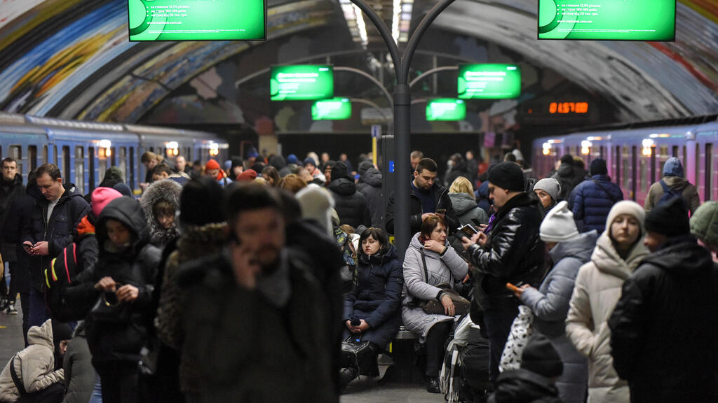Ukrainians shelter in underground train stations as Russia launches massive strike on cities 