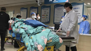 מטופל שכניסתו סורבה ל בית חולים ב מחוז חביי ב סין בצל התפרצות קורונה 21 בדצמבר