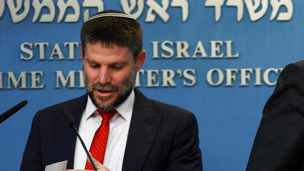 Prime Minister Benjamin Netanyahu and Finance Minister Bezalel Smotrich hold a news conference to present their plan for dealing with price increases in Israel's economy at the Prime Minister's office in Jerusalem, January 11, 2023 