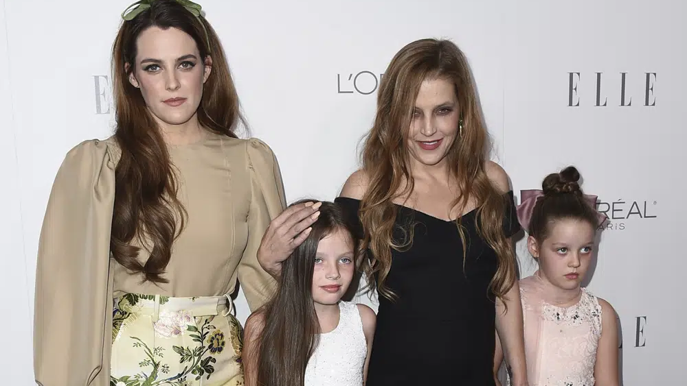 Lisa Marie Presley, second right, her daughter Riley Keough, left, and her twin daughters Finley Lockwood and Harper Lockwood, arrive at the 24th annual ELLE Women in Hollywood Awards at the Four Seasons Hotel Beverly Hills on Monday, Oct. 16, 2017, in Los Angeles 