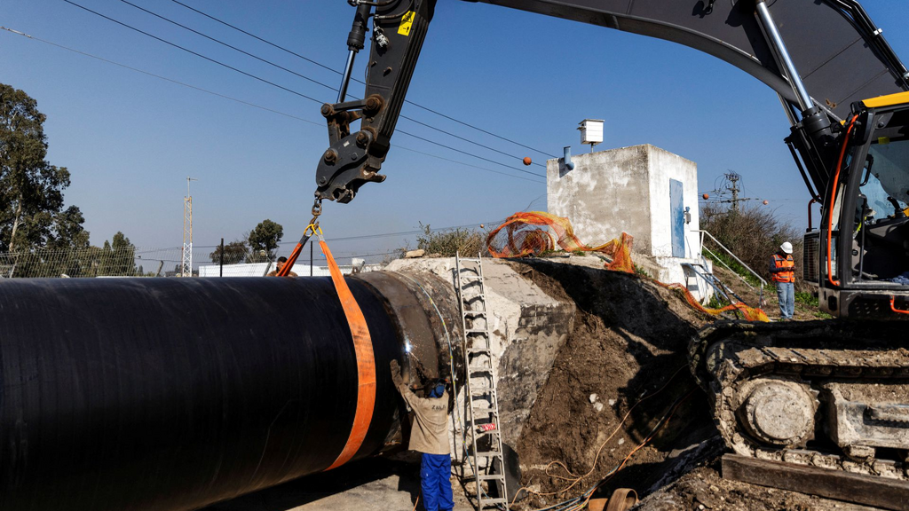 Workers conduct construction work to connect the city of Beit Shean to the national water carrier project, as part of an initiative by Mekorot, Israel's national water company, near Kfar Yehoshua in northern Israel, January 23, 2023 