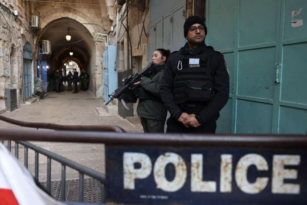 Israeli police stand guard in Jerusalem's Old City following a stabbing attack on February 13, 2023