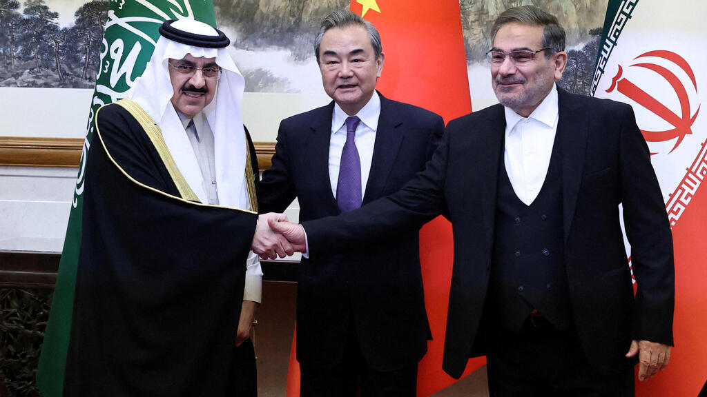 Chain's top diplomat Wang Yi, Ali Shamkhani, the secretary of Iran’s Supreme National Security Council, and Minister of State and national security adviser of Saudi Arabia Musaad bin Mohammed Al Aiban pose for pictures during a meeting in Beijing, China, March 10, 2023 