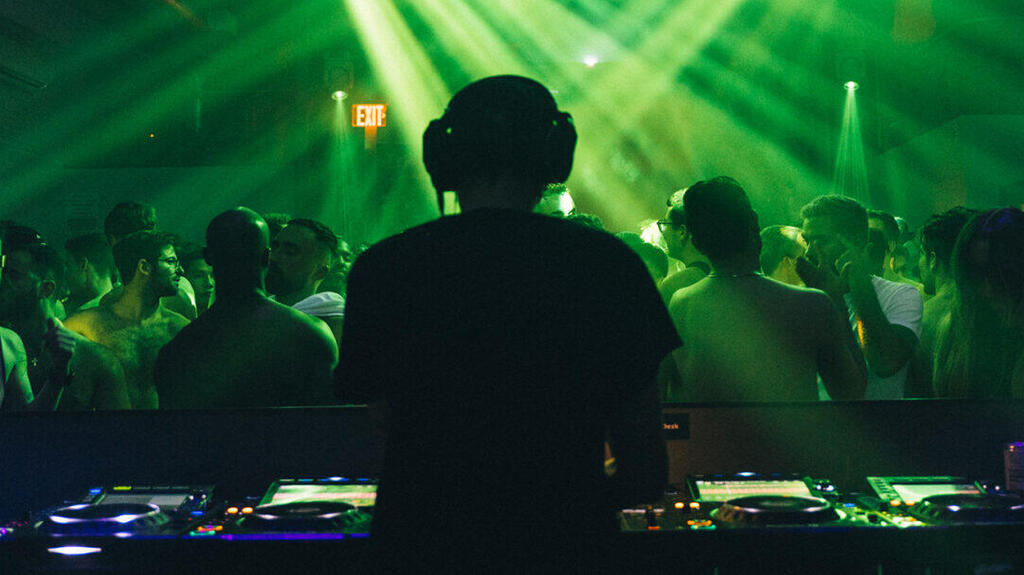 A DJ performs at the opening weekend of Silo, a new Jewish-owned club in Williamsburg, Brooklyn 