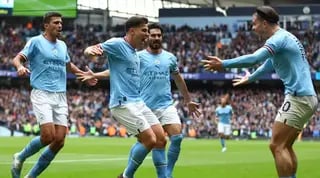 שחקני מנצ'סטר סיטי חוגגים